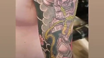 Full arm sleeve tattoo by Brad Schlinke